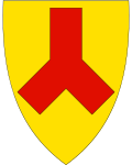 „In Gold ein roter, (frei)schwebender Göpel.“
