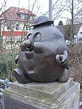 Kartoffeldenkmal Knolli auf der Geranienbrücke
